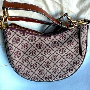 AUTH Tory Burch T Monogram Jackard Studded Mini Crescent Bag in Claret.